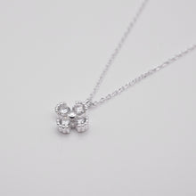 Load image into Gallery viewer, This elegant and beautiful eternity necklace silver jewelry is from Ginkawa designer jewellery. 925 sterling silver four-leaf clover necklace with adjustable extension chain. Good luck gift, for meaningful days. Best gift for your friends, birthday, mother&#39;s Day and new year gift. 925 純銀四葉草水鑽項鏈，閃亮配件，適合天天配戴，適合出席重要場合，生日送禮，情人節禮物，聖誕交換禮物，出遊穿搭配件。
