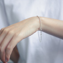 Load image into Gallery viewer, Wearing Ginkawa 925 Sterling Silver double knot bracelet  with mixed different chain in one bracelet. Best gift for BFF and birthday and which can bring good lucky. 925 純銀雙結手鏈，簡單可愛款式，任何風格都可駕馭，七夕情人節禮物，紀念日禮物，出遊旅行穿搭，約會聚餐可搭配。
