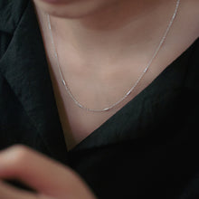 Load image into Gallery viewer, Wearing Ginkawa 925 sterling silver cylinder necklace simple classic chain. temperament style, delicate jewelry, best gift, women&#39;s day, anniversary gift, gift for her. 925 純銀細圓柱層次素項鏈，氣質高雅風格，細緻有層次的配件，適合日常搭配，適合出席重要場合，紀念日禮物，母親節禮物，閨蜜禮物。
