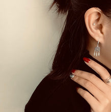 Load image into Gallery viewer, Lady wearing 925 sterling silver Dream catcher earrings in Tiffany blue giftbox which used hypoallergenic hook earrings.
