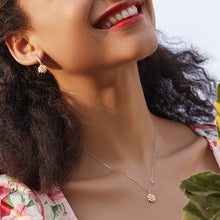 Load image into Gallery viewer, Smiling Lady is wearing Ginkawa sunflower long necklace with small golden leaf. Adjustable necklace in two tone plating (gold and platinum)
